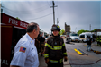 Fire Chief and Firefighter having a conversation