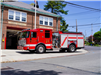 Fire truck parked outside of fire station