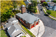 Aerial shot of a fire station with red garage doors