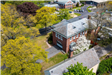 Aerial shot of a fire station with red garage door